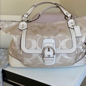 Bone colored coach satchel bag w/crossbody strap.